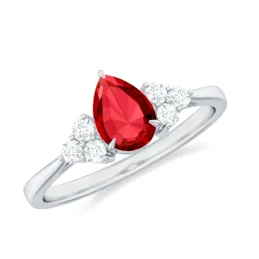 1 CT Pear Shaped Lab Grown Ruby Solitaire Ring with Diamond Trio