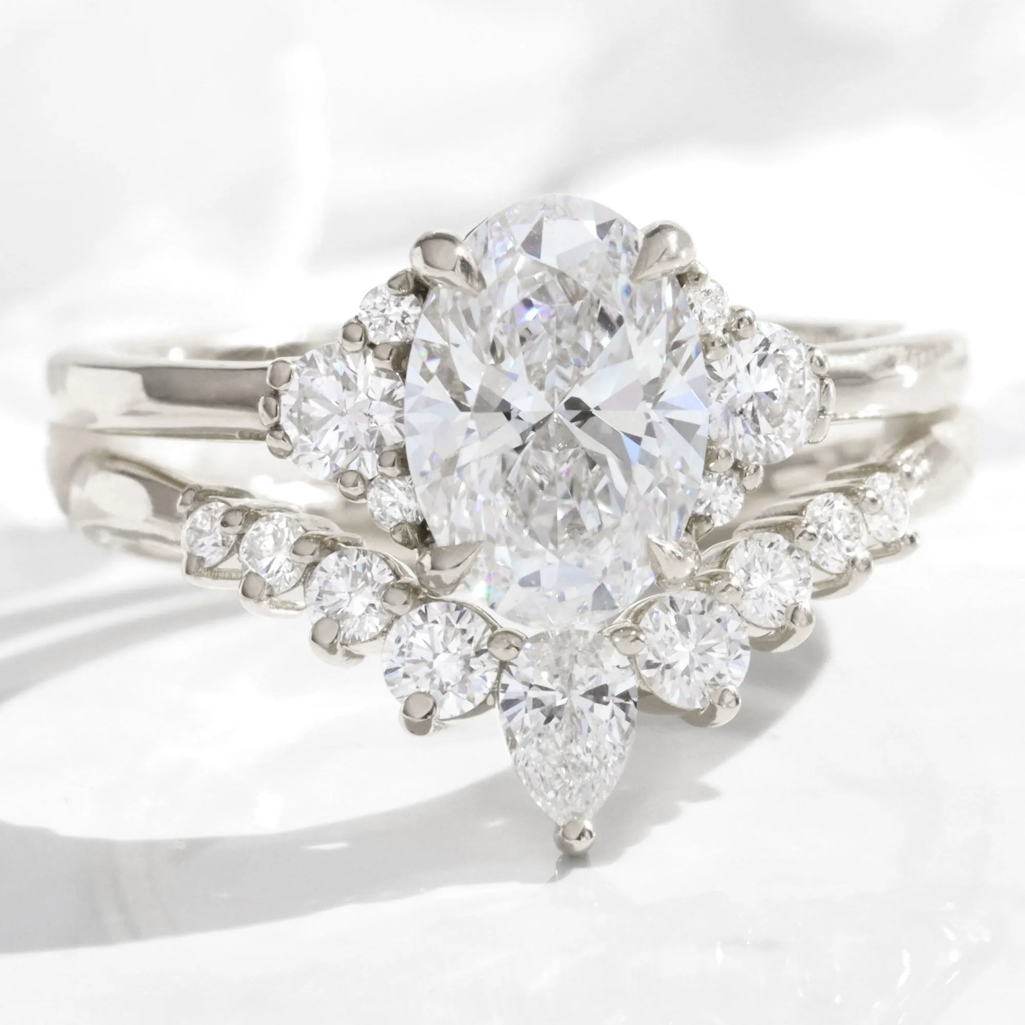 2.18 Ct. Oval Lab Diamond 3 Stone Ring Set w/ Wishbone Wedding Band in Flora Setting