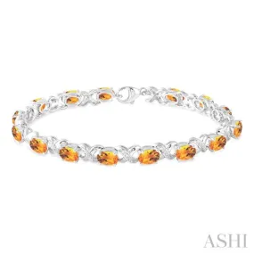 7x5  MM Oval Cut Citrine and 1/20 Ctw Round Cut Diamond Fashion Bracelet in Sterling Silver
