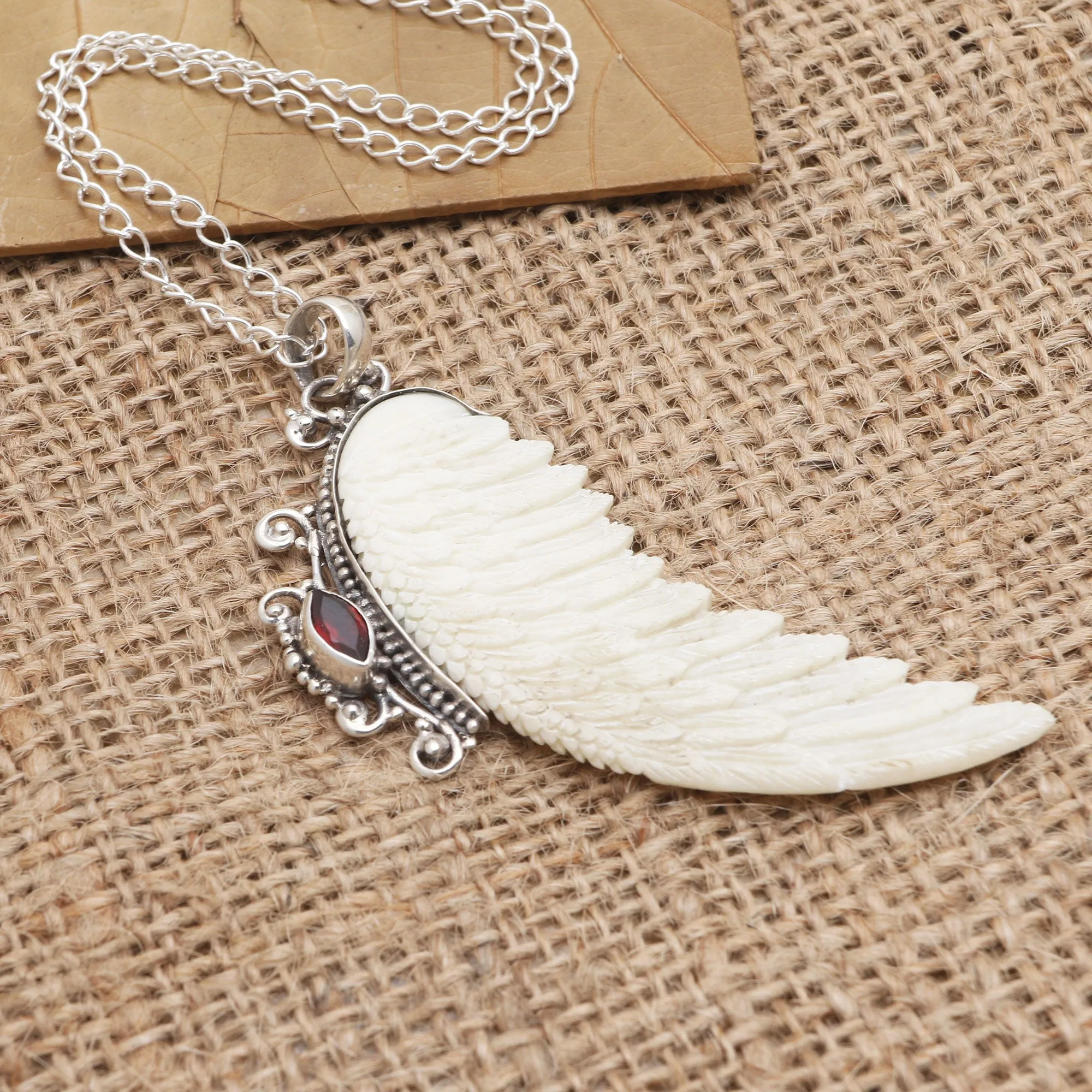 Garnet and Sterling Silver Angel Wing Pendant Necklace - Pale Angel | NOVICA