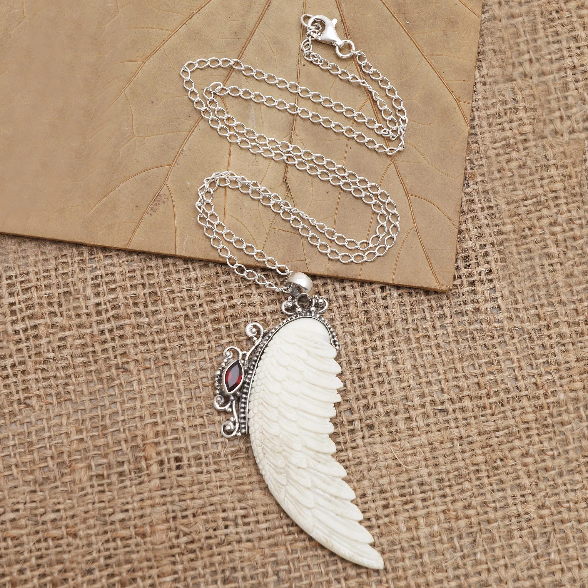 Garnet and Sterling Silver Angel Wing Pendant Necklace - Pale Angel | NOVICA