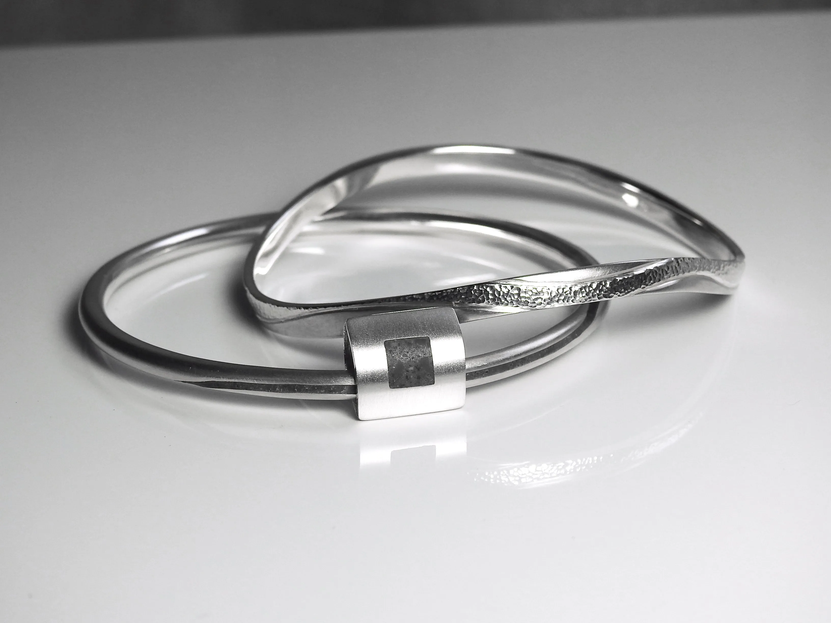 Limestone inlay bangle with floater