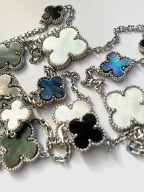 Mixed Size Onyx and White and Gray Mother of Pearl Quatrefoil Silver Plated Necklace