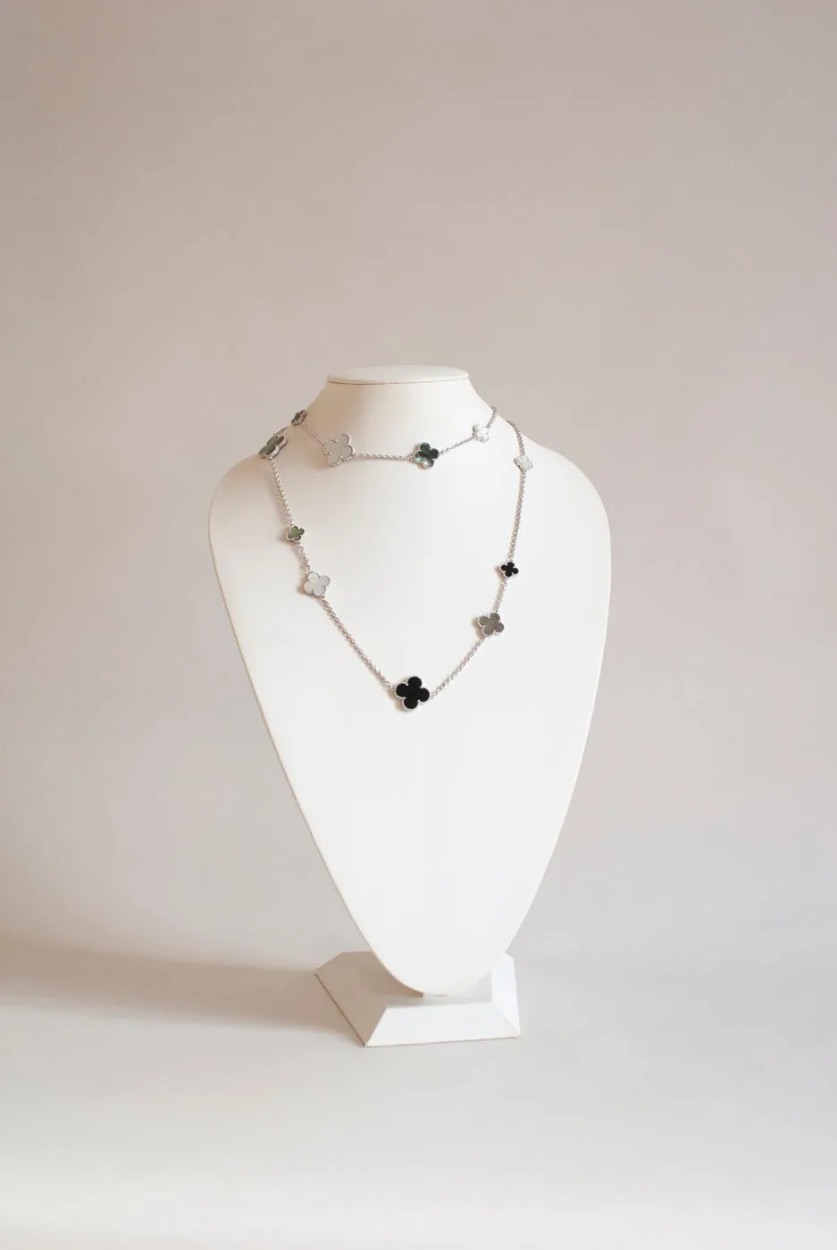 Mixed Size Onyx and White and Gray Mother of Pearl Quatrefoil Silver Plated Necklace